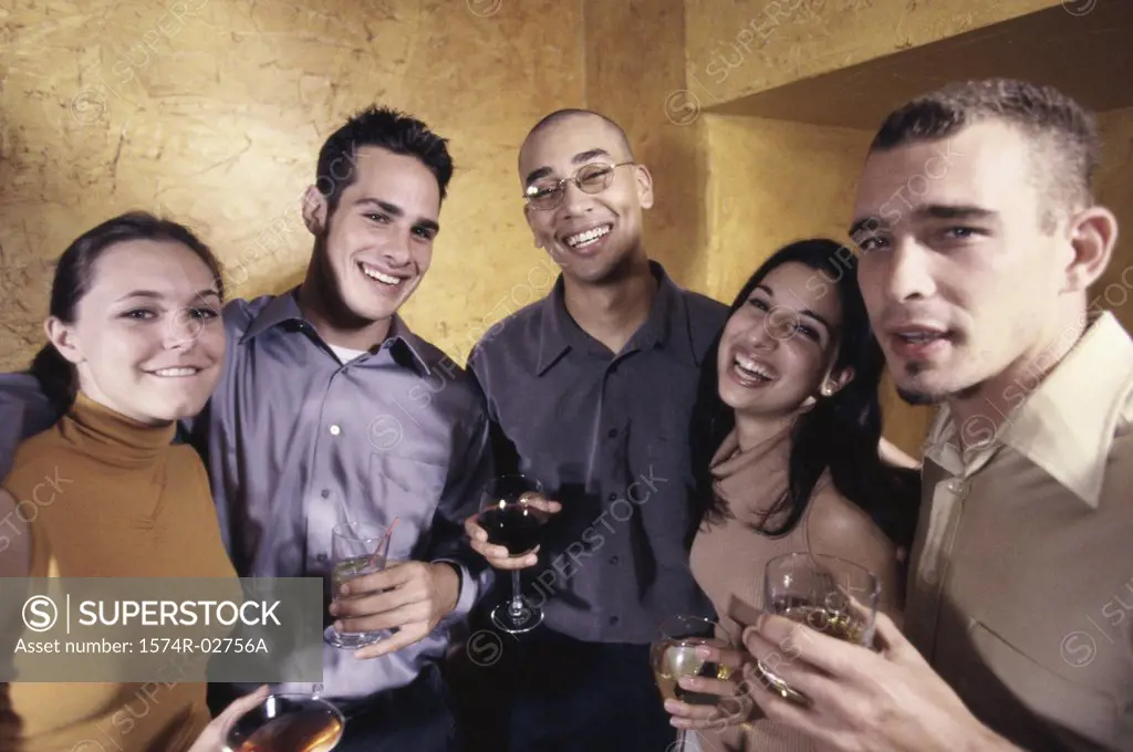 Portrait of a group of young people in a bar