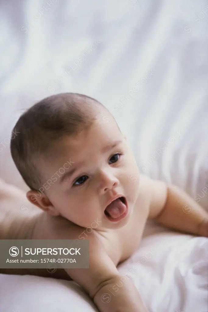 Close-up of a baby boy with his mouth open