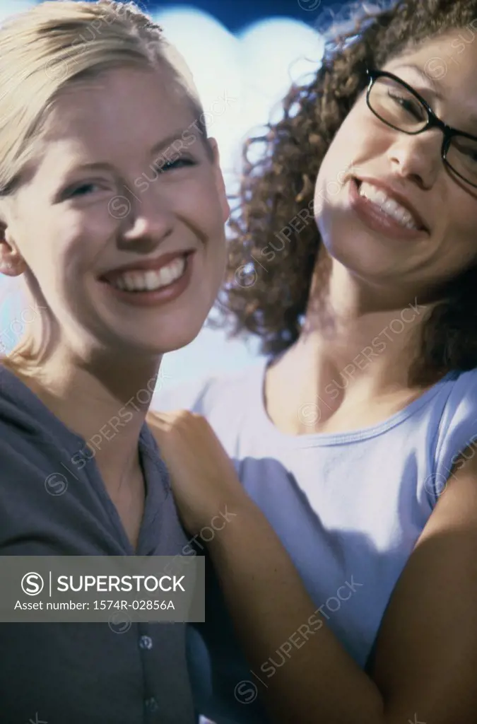 Close-up of two young women smiling