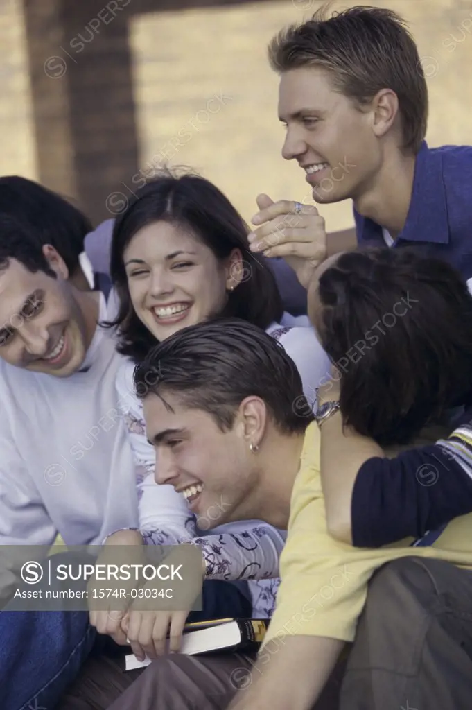 Side profile of a group of teenagers smiling