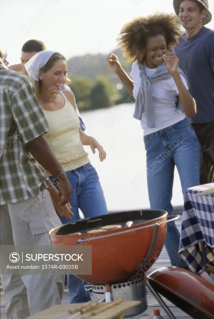 Group of young people at a barbecue