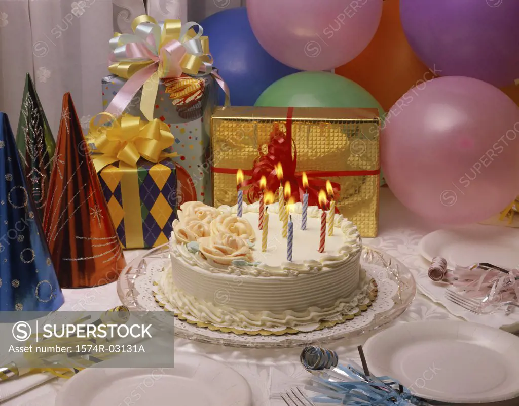 Close-up of a birthday cake and presents