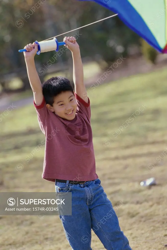 Boy flying a kite