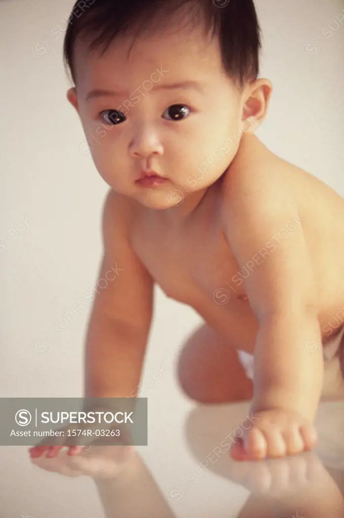 Close-up of a baby boy sitting