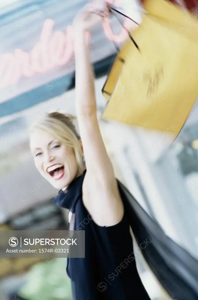 Young woman carrying a shopping bag