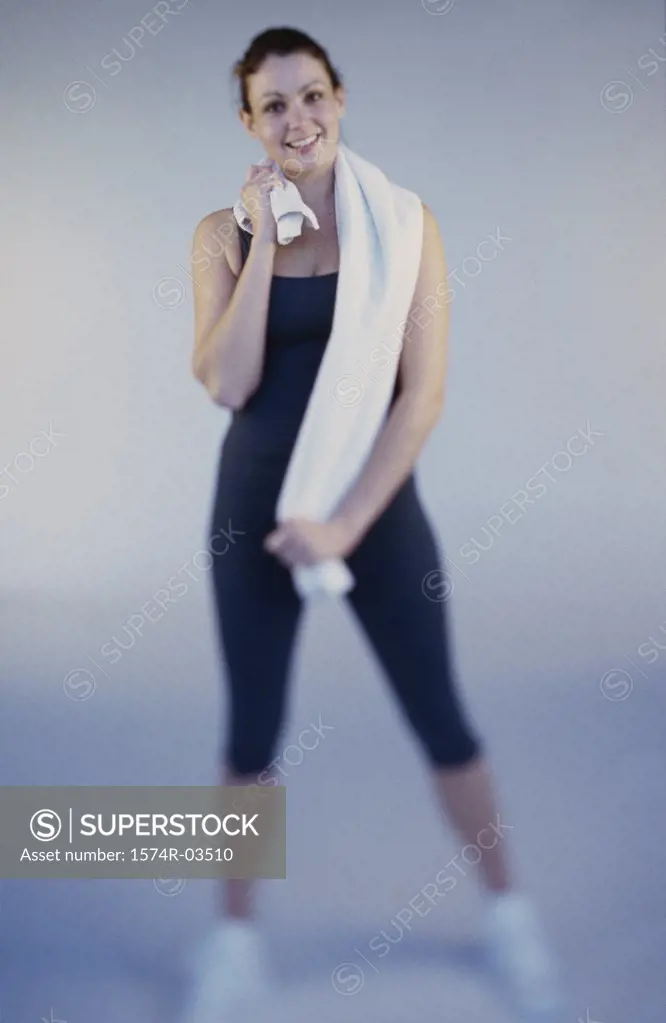 Portrait of a young woman exercising