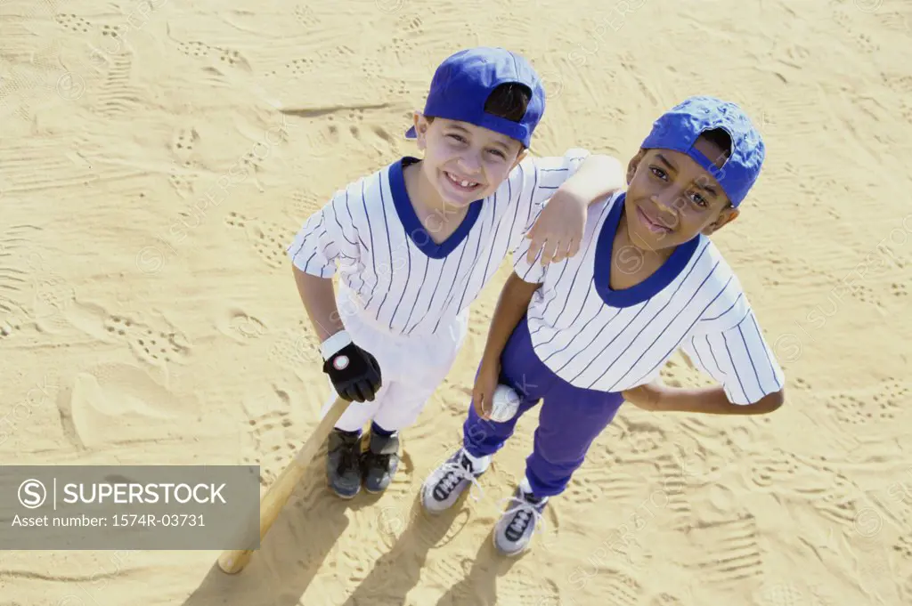 Portrait of two boys in baseball uniforms