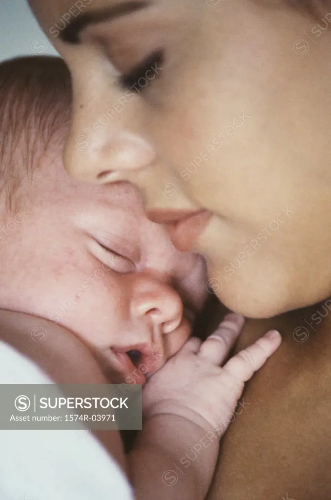 Close-up of a mother holding her baby boy