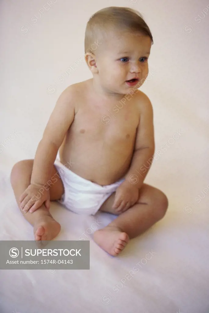 High angle view of a baby boy sitting