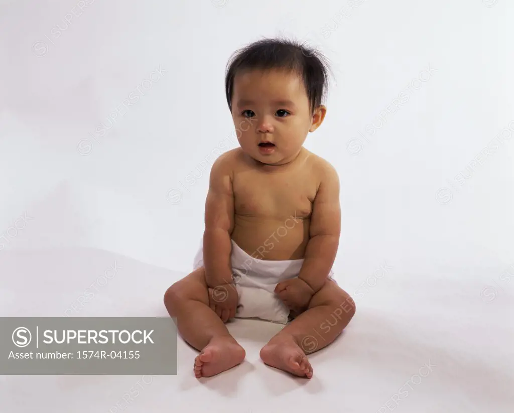 Portrait of a baby boy in diapers