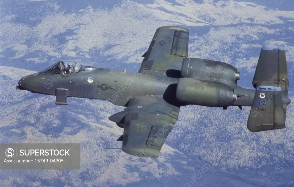 Aerial view of an A-10 Thunderbolt fighter plane in flight