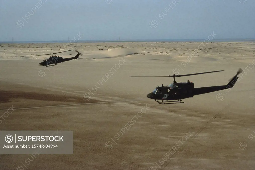 UH-1N Iroquois helicopter and AH-1Sea Cobra helicopter in flight