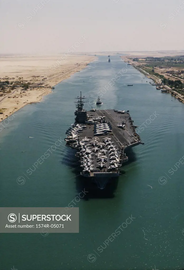 High angle view of the USS Dwight D. Eisenhower aircraft carrier moving through the Suez Canal