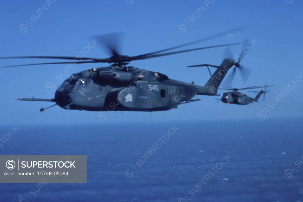 Two MH-53E Sea Dragons flying over the Persian Gulf