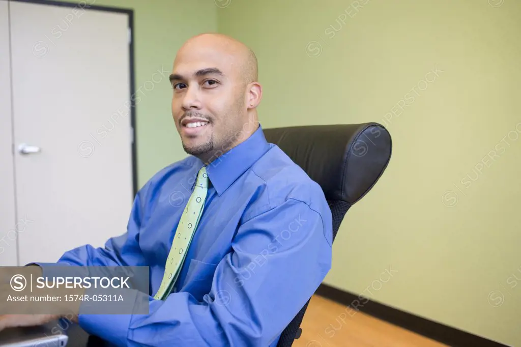 Portrait of a businessman sitting in an office
