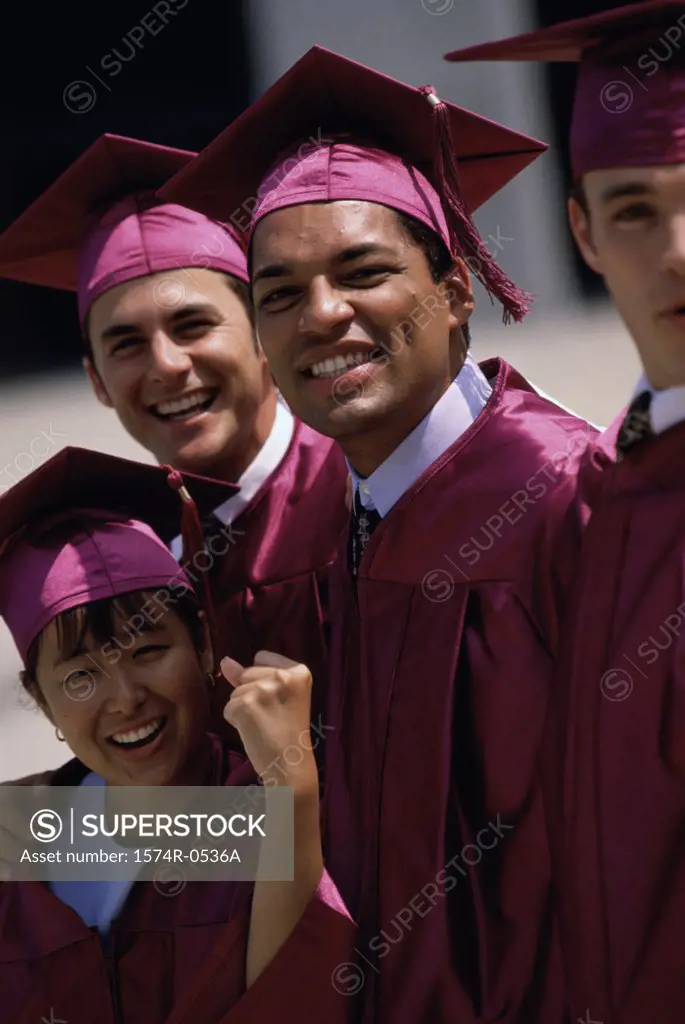 Students wearing their graduation outfits