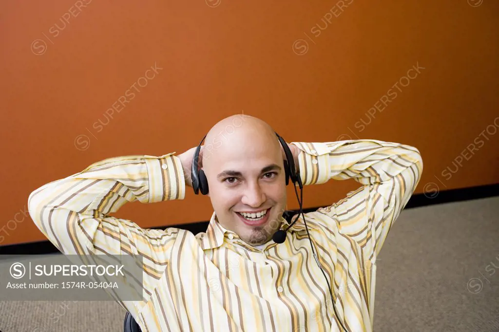 Portrait of a male customer service representative wearing a headset