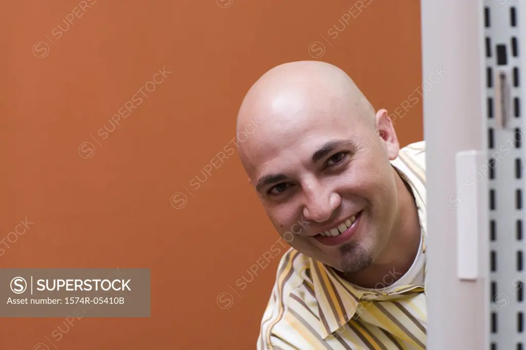 Portrait of a businessman smiling in an office