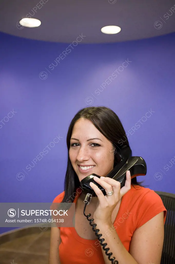 Portrait of a businesswoman talking on a telephone