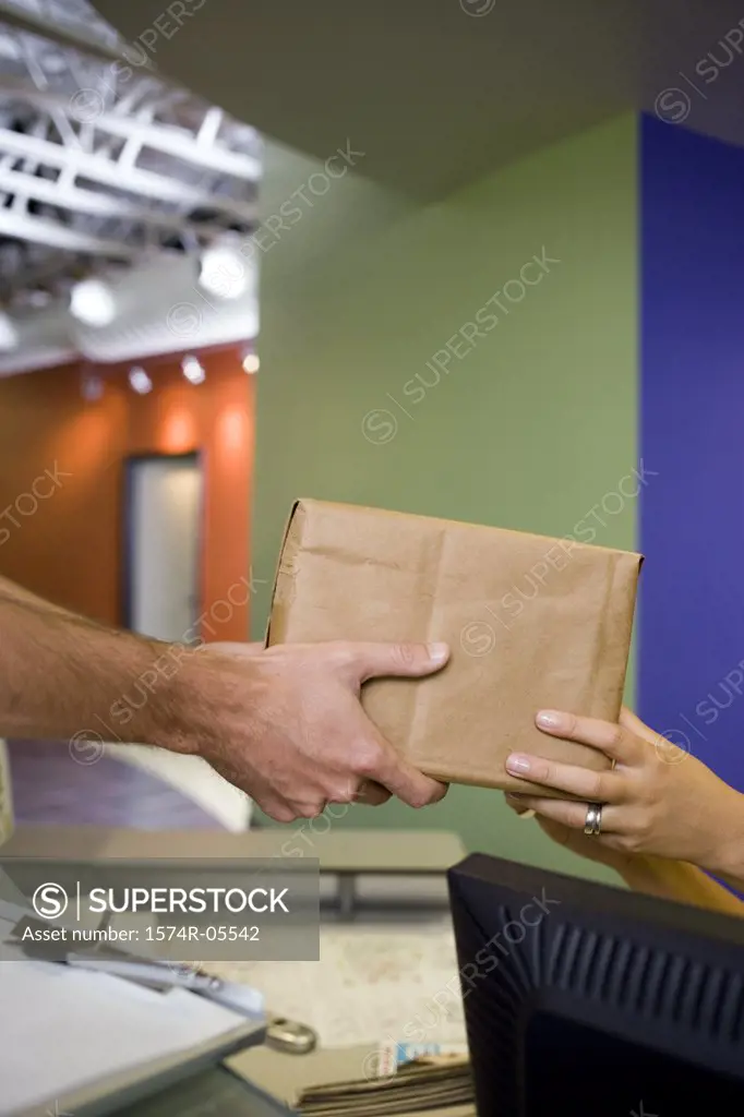Delivery man delivering a parcel