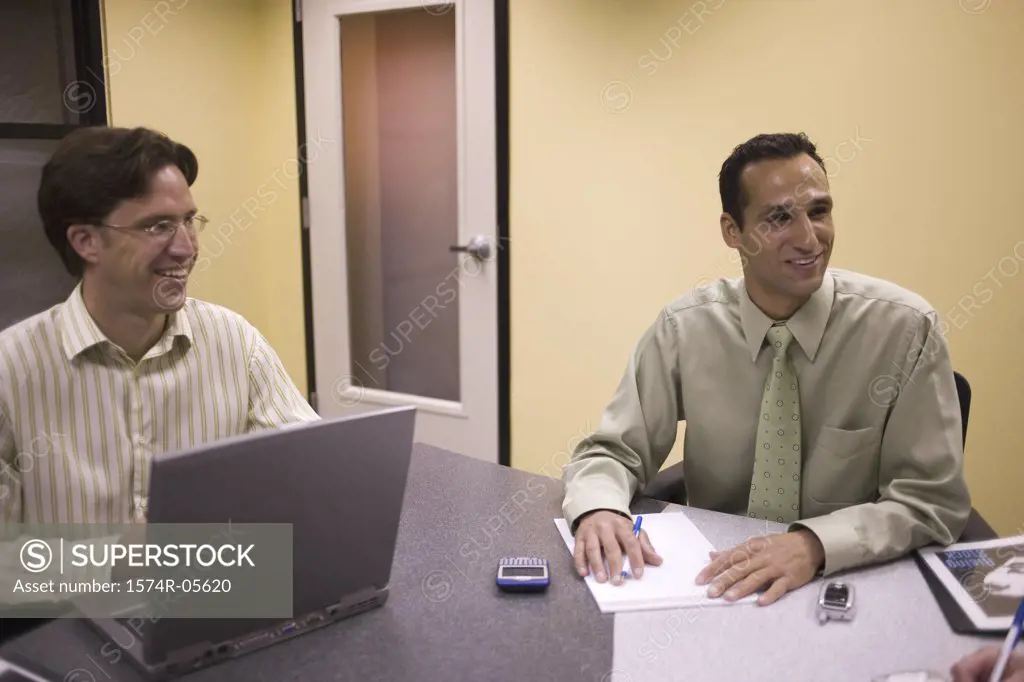 Two businessmen in a conference