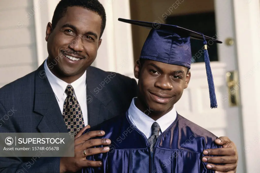 Portrait of a father with his graduate son