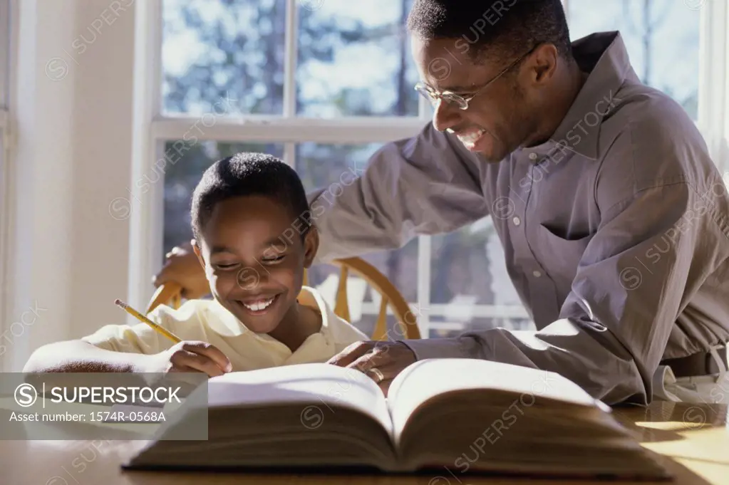 Father helping his son with homework