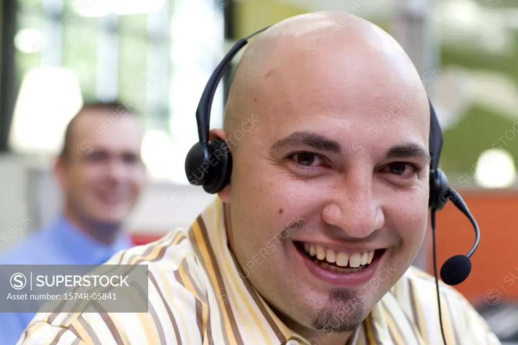 Close-up of a male customer service representative wearing a headset