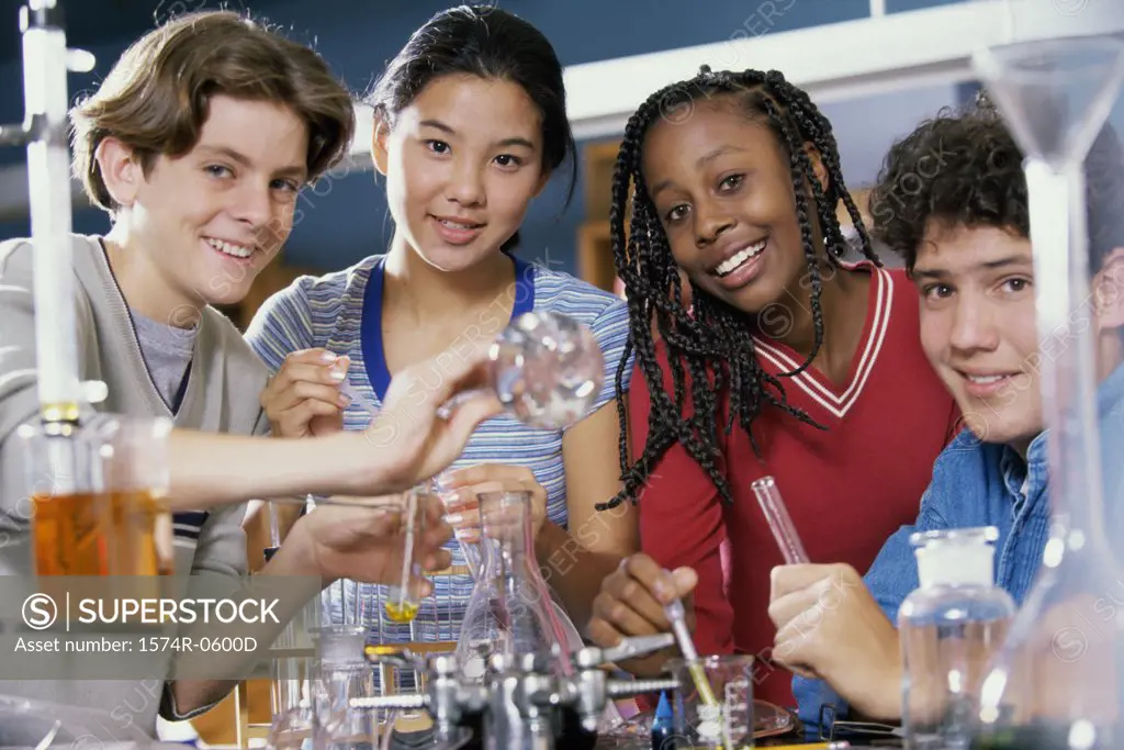 Portrait of teenagers at a chemistry laboratory