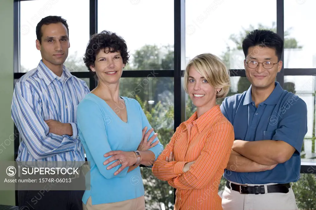 Portrait of a group of business executives standing in an office