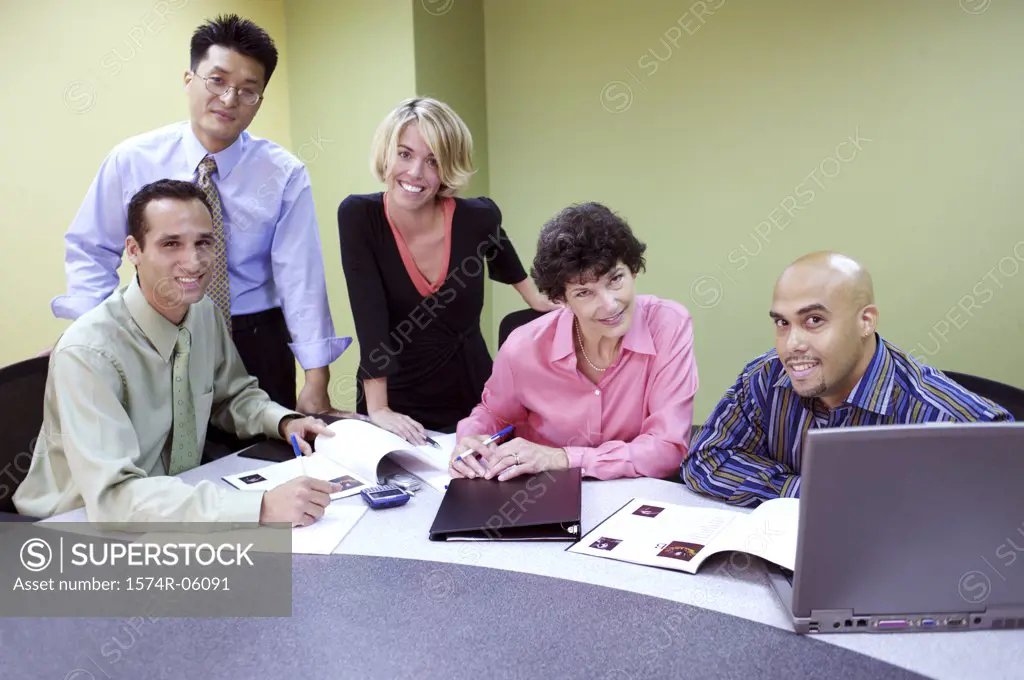 Portrait of a group of business executives in a conference room