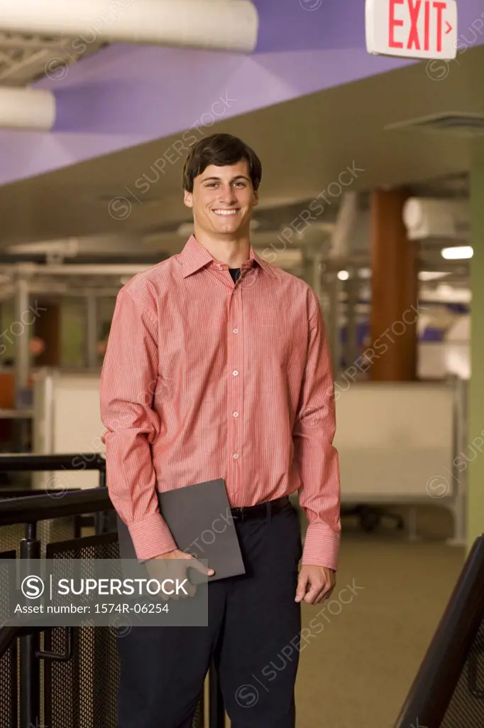 Portrait of a businessman standing in an office