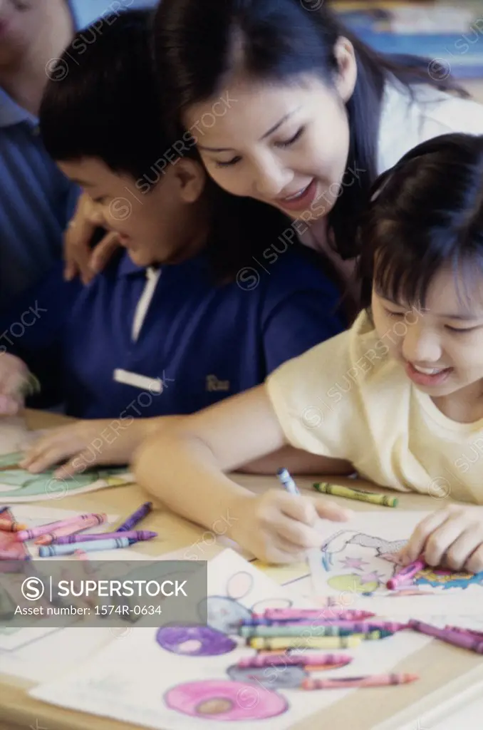 Mother and her two children coloring