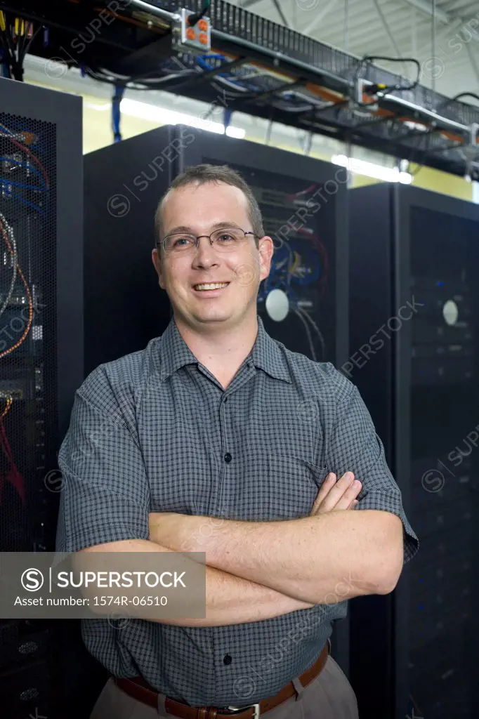 Technician standing in a server room
