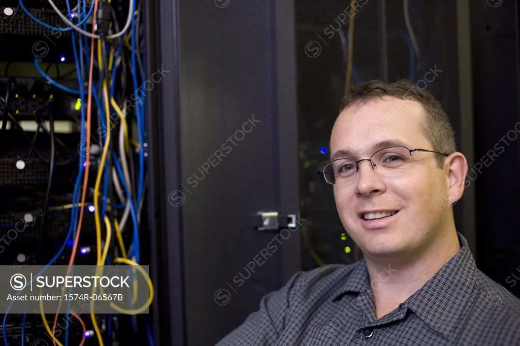 Portrait of a technician in a server room