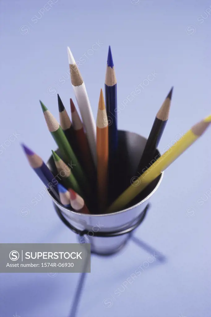 Close-up of colored pencils in a container