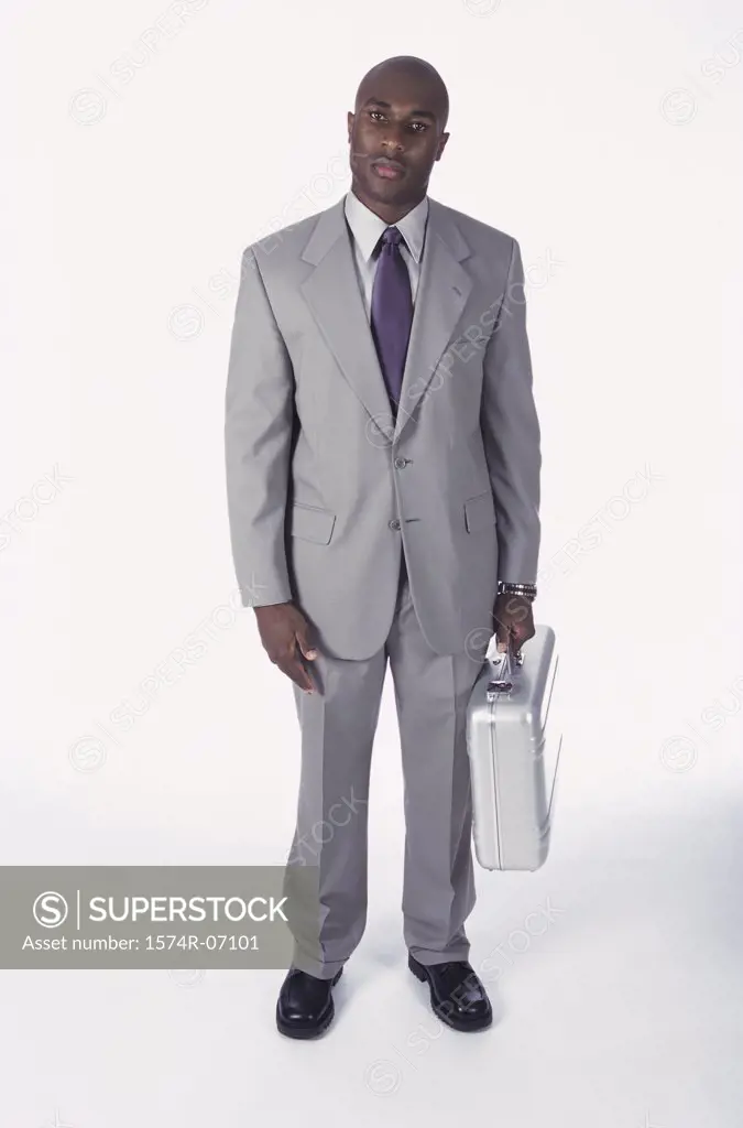 Portrait of a businessman holding a briefcase