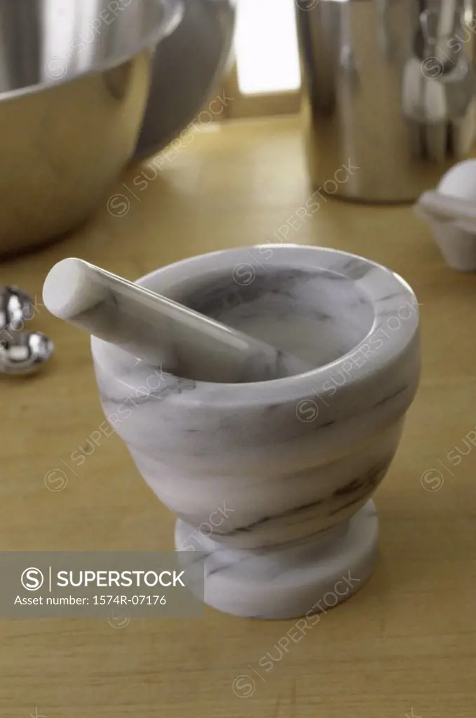 Close-up of a mortar and a pestle