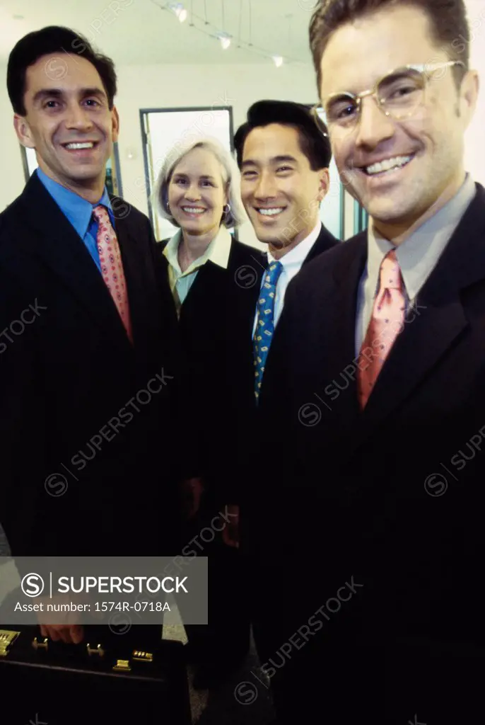 Portrait of a group of business executives smiling