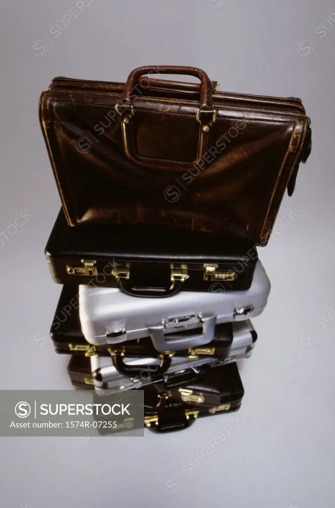 High angle view of a stack of briefcases