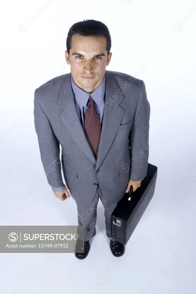 Portrait of a businessman carrying a briefcase