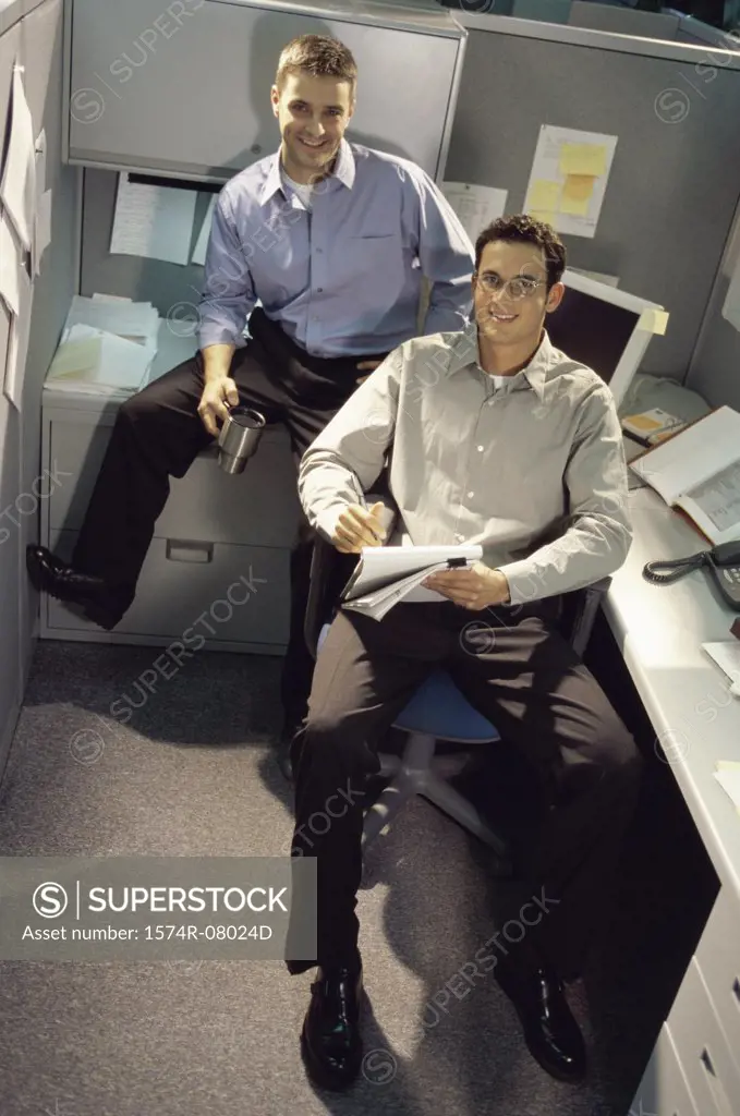 Portrait of two businessmen smiling