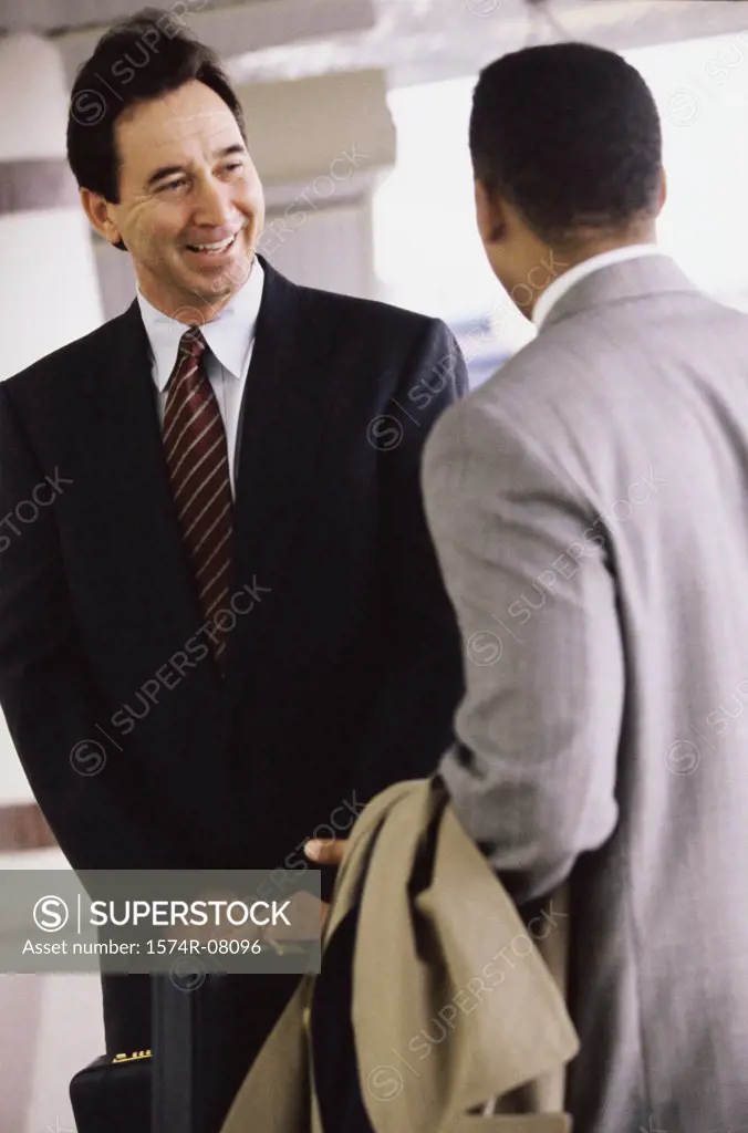 Two businessmen discussing in an office