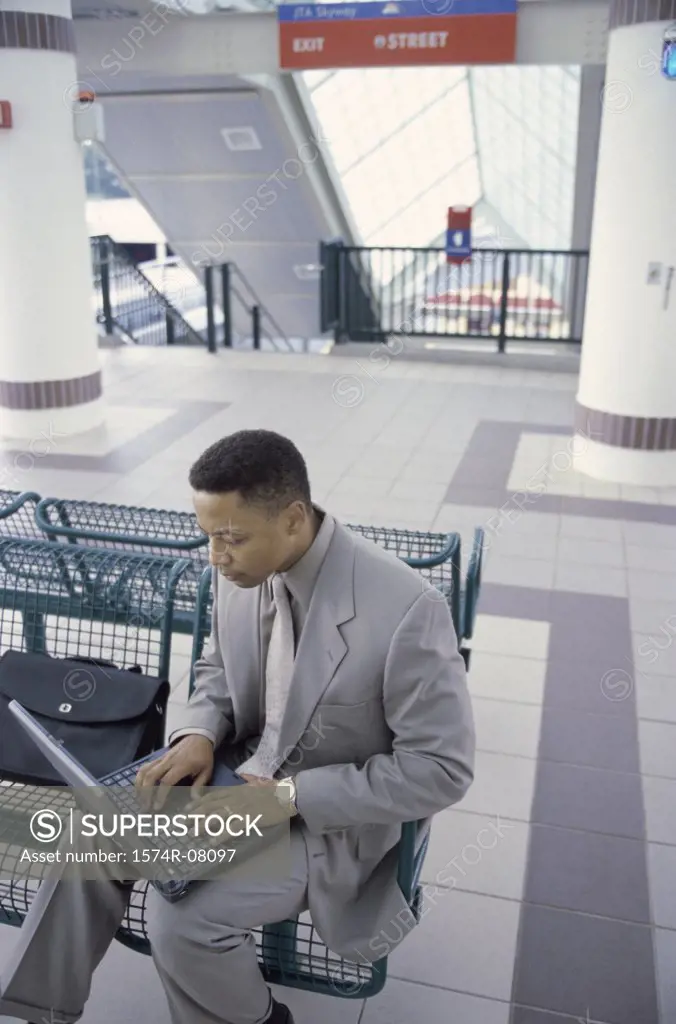 High angle view of a businessman working on a laptop