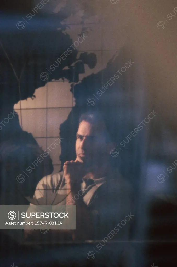 Reflection of a man in glass