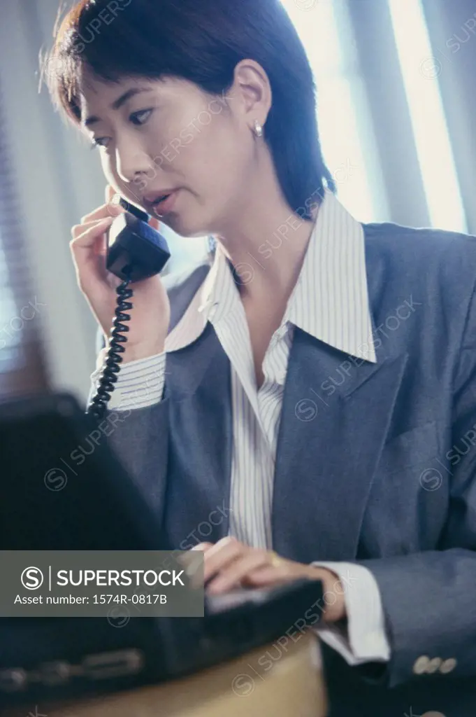 Businesswoman talking on a telephone