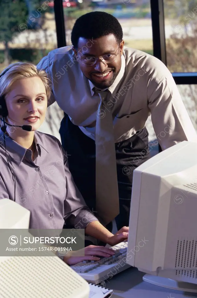 Portrait of two customer service representatives smiling