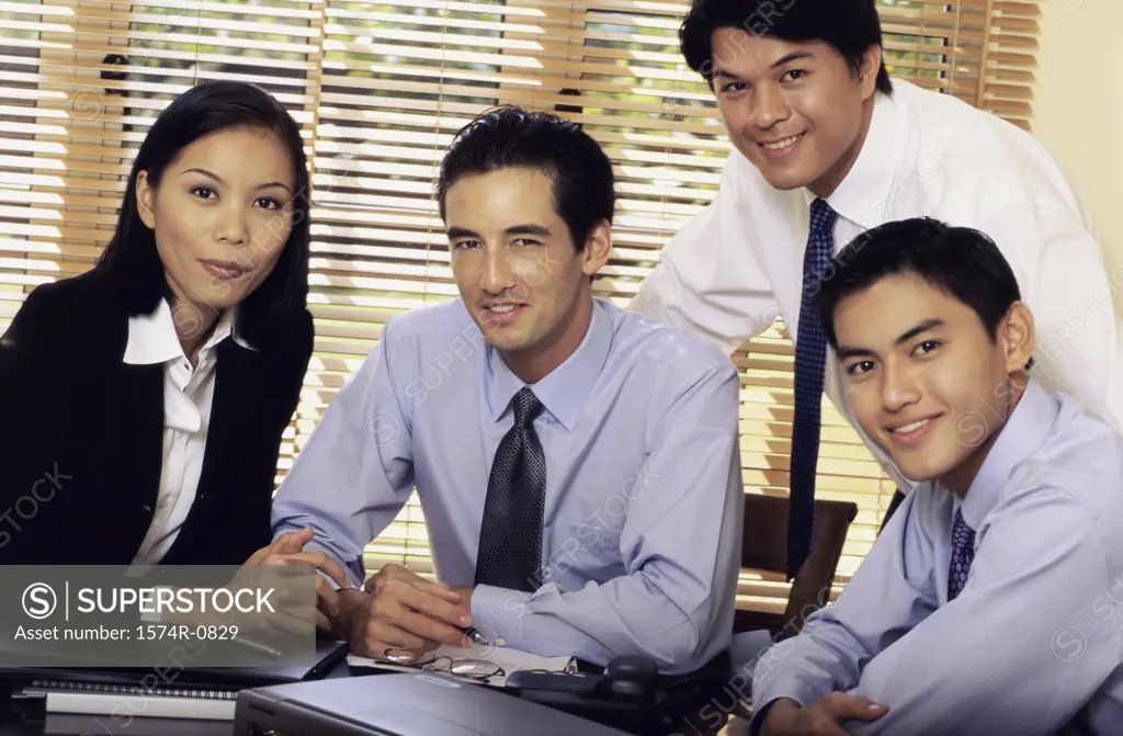 Portrait of a group of young business executives in an office