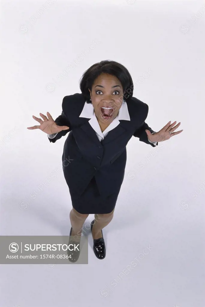 Portrait of a businesswoman standing with her mouth wide open