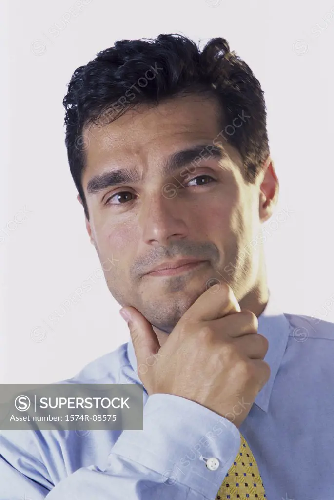 Portrait of a businessman with his hand on his chin